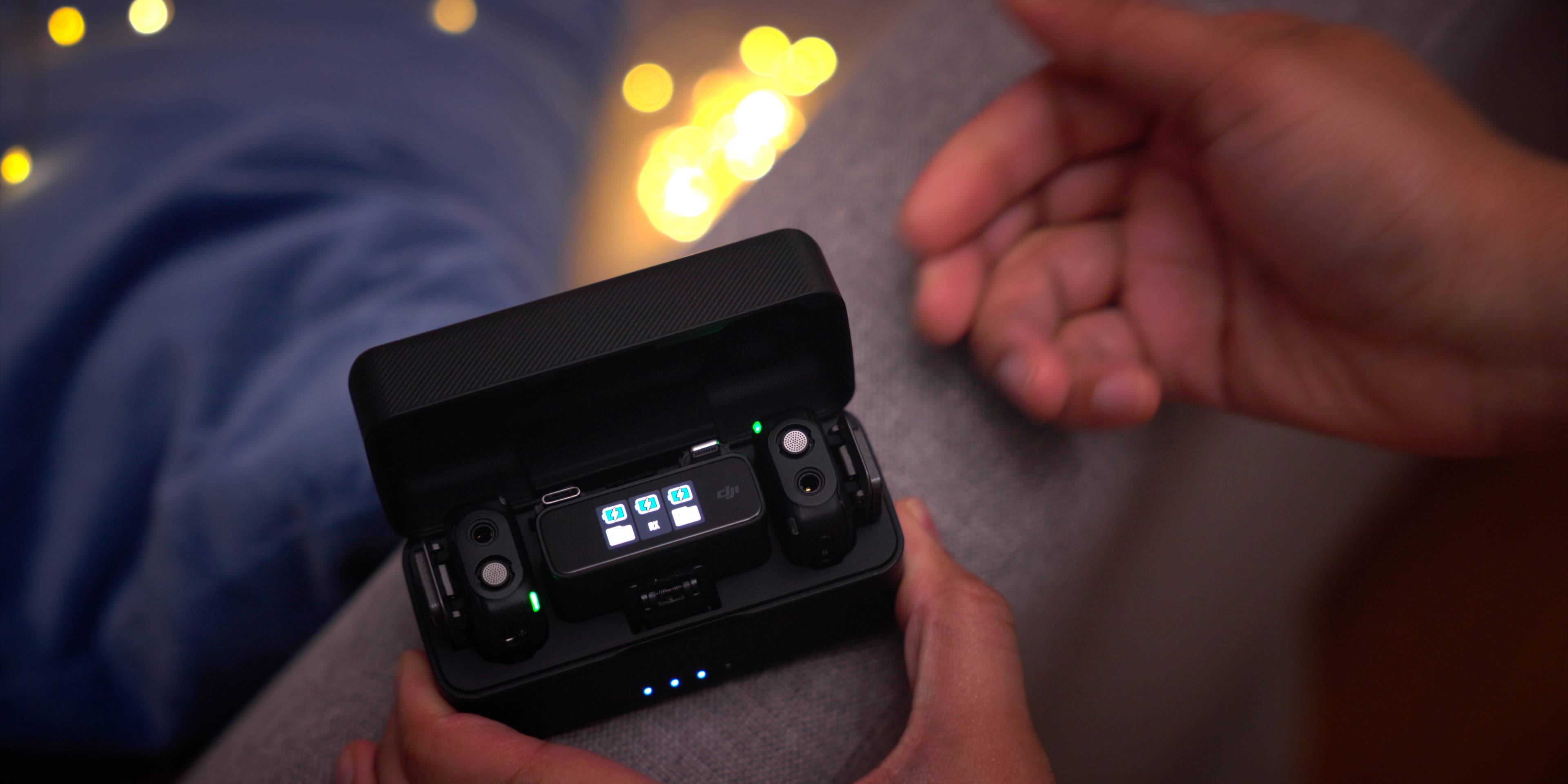 DJI-Mic-review-open-charging-case-on-couch